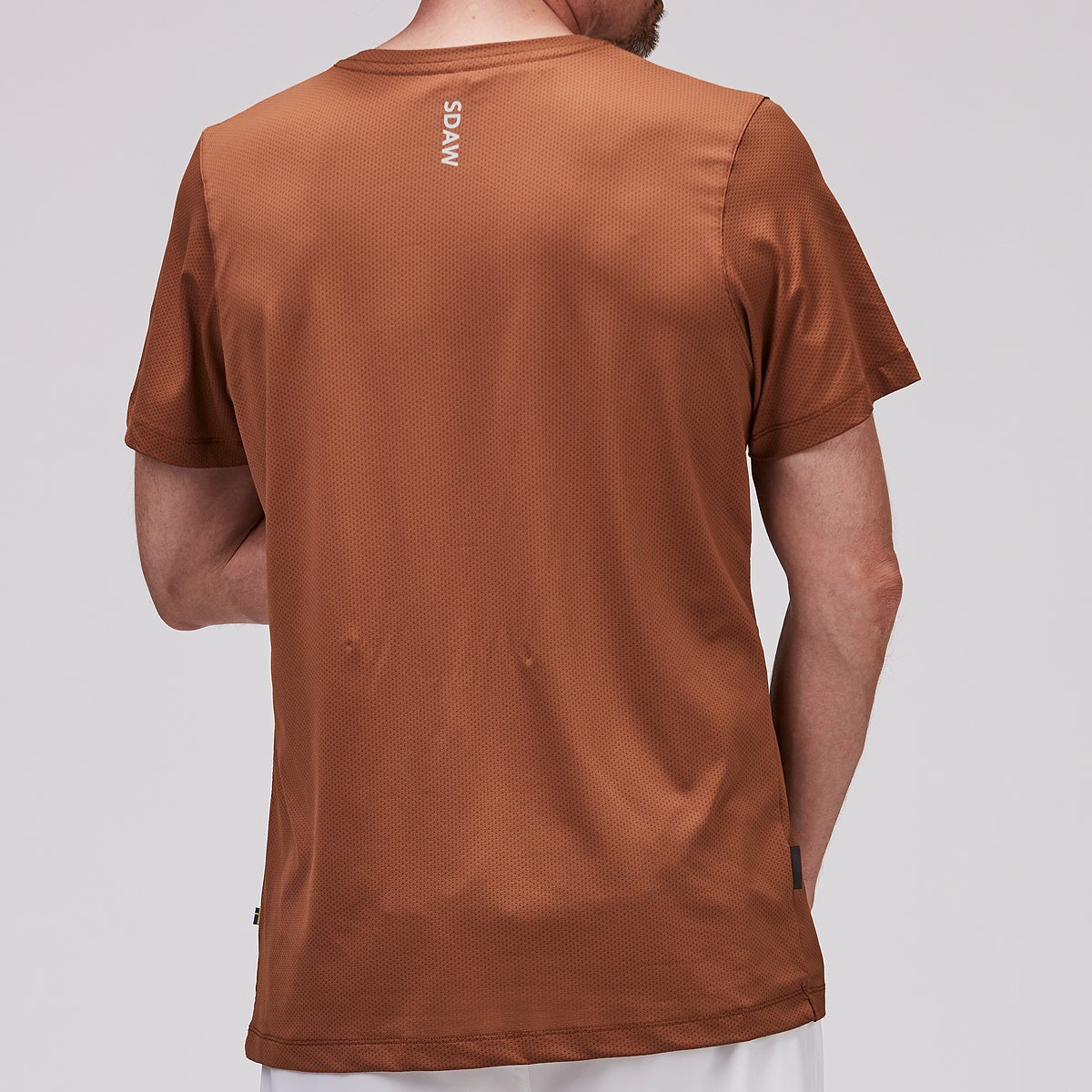 SDAW Padeltrölja brons bakifrån